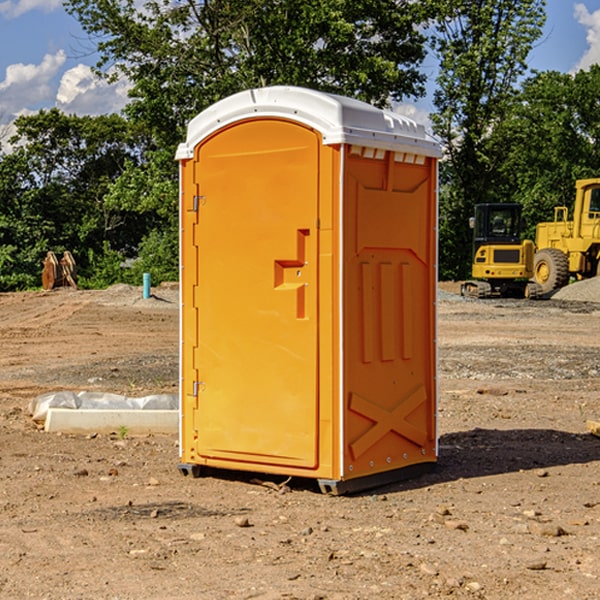 how often are the portable restrooms cleaned and serviced during a rental period in Newhall IA